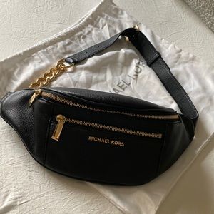 Michael Kors leather sling pack.